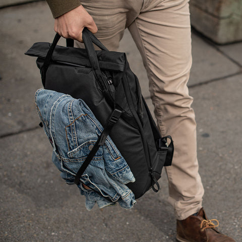 Jacket supported by the totepack external carry strap